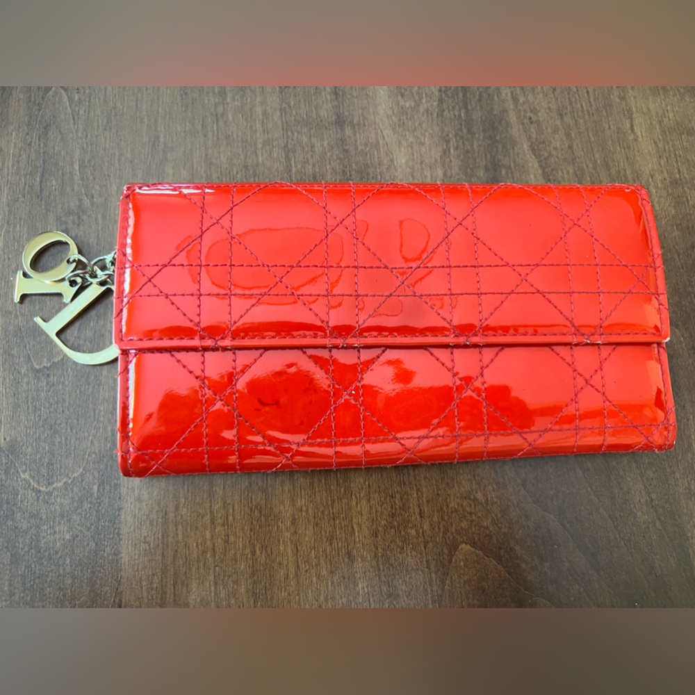 Used red colour wallet lady Dior . You can see on fotos condition. I
